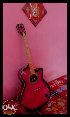 Pink And Black Acoustic Guitar