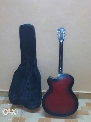 Red Acoustic Guitar With Gig Bag
