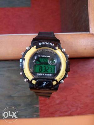 Round Black And Yellow Sonata Digital Watch
