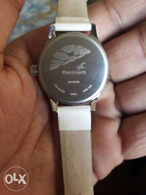 Round Silver Fastrack Watch With White And Brown Leather