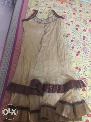 Salwar suit cream color. If interested please