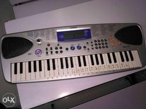 Silver Casio Electronic Keyboard