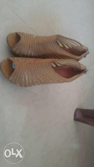 Size 37, 4-inch heel bought frm Metro shoes.