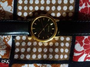 Sonata golden watch with leather belt