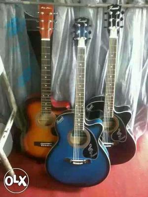 Three Black,blue Burst And Sunburst Cutaway Acoustic Guitars