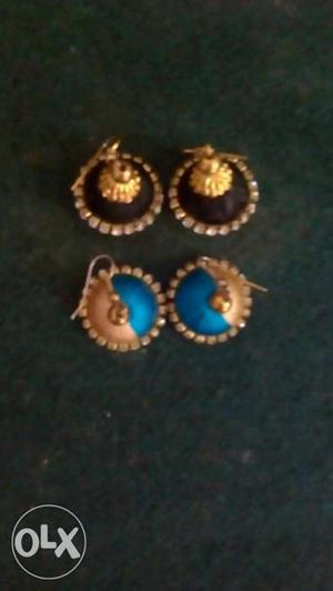 Two Pairs Of Brown And Blue Jhumka Earrings