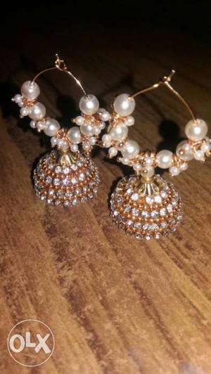 Two Pearl Jhumka Earrings