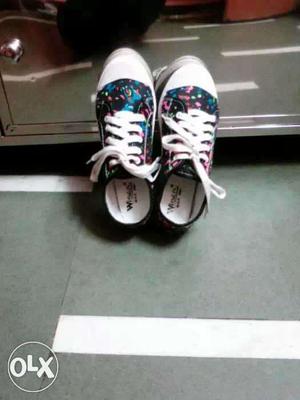 White-black-pink-and-green Mid Top Sneakers