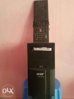 Black Acer Computer Tower With Corded Computer Keyboard