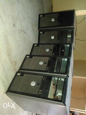 Five Black And Grey Computer Towers
