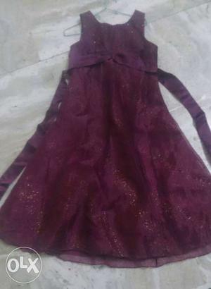 10 years girl's long frock in maroon color