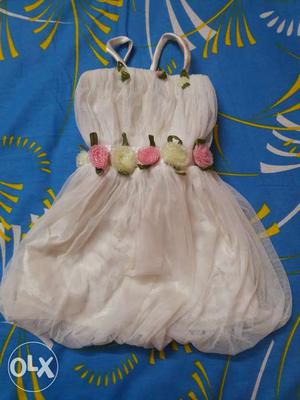 7 Beautiful and never worn party frocks for 1 yr