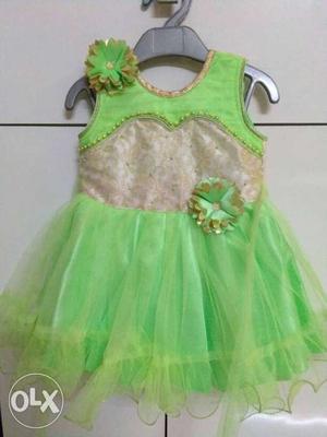 Baby's Green And White Sleeveless Dress