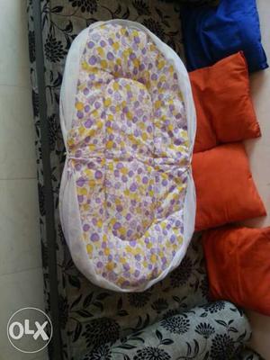 Baby's Purple And Yellow Floral Babynest Not much used Safe
