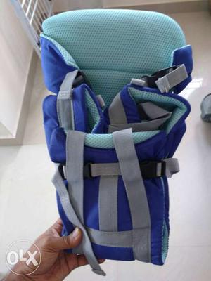 Baby's Teal And Blue Carrier
