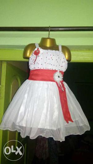 Baby's White And Red Sleeveless Dress