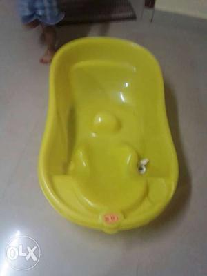Baby's Yellow Plastic Bath Tub