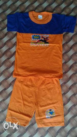 Boy's Orange And Blue Shirt And Shorts