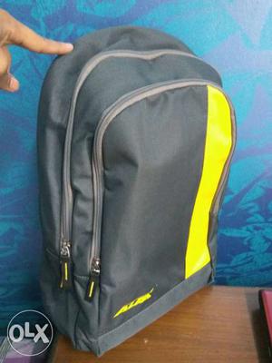 Brand new green and yellow backpack