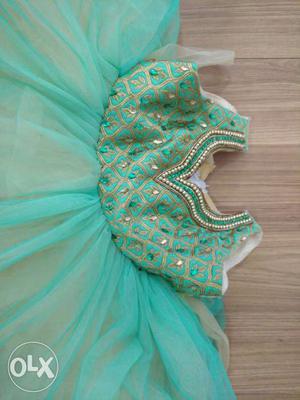 Brand new green frock (unused) suitable for 6 to