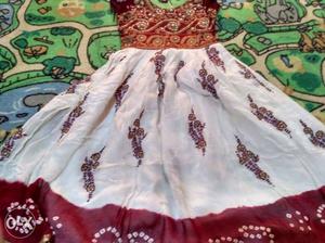 Frock with embroidary work. white red colour. 1