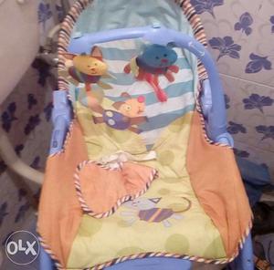 Orange And Blue Bouncer Seat