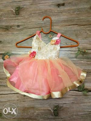 Peach and golden frock