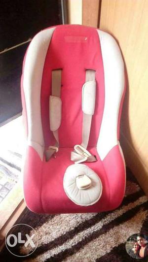 Red And White Car Booster Seat
