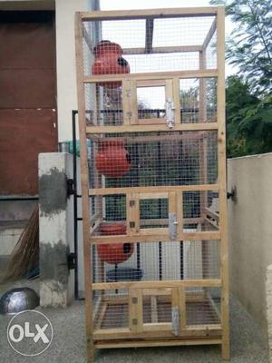 Brown Wooden And Gray Screen Bird Cage