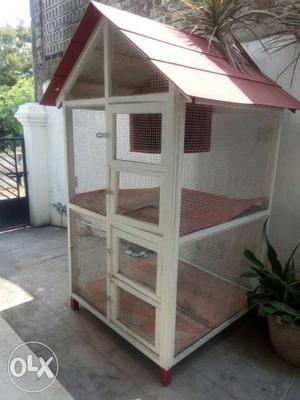 White And Red Wooden Frame Cage