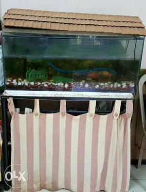 Fish Tank with iron stand. stand has 2 shelves.