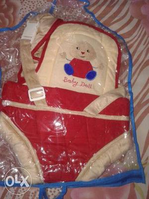Baby's Red, Blue, And White Carrier