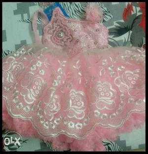 Beautiful baby pink frock to compliment the