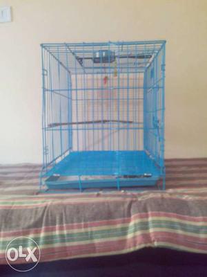 Foldable steel cage.