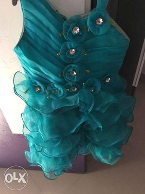 Hardly used Green Party wear frilled knee length