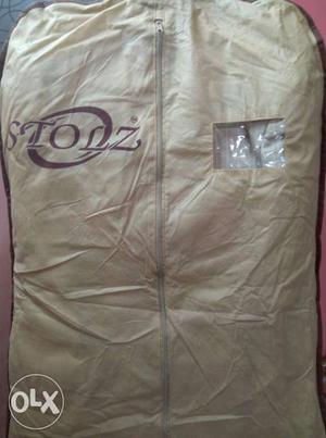 Offwhite cot with trousers with cover untouch