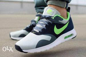 Pair Of Black-gray-white-and-green Nike Sneakers