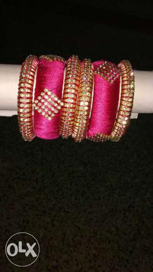 Pink And Gold-colored Threaded Bracelet