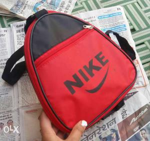 Red n black trevelling bag..wid foldable feature