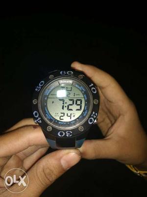 Round Grey And Black Digital Watch With Blue Strap