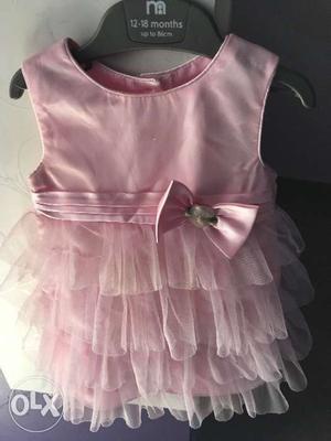 Satin frock for  months old baby. Baby pink