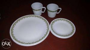 4 large plates 4 small plates 4 mugs Good foreign