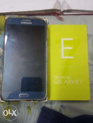 Almost new condition Samsung Galaxy E7 with bill box and all
