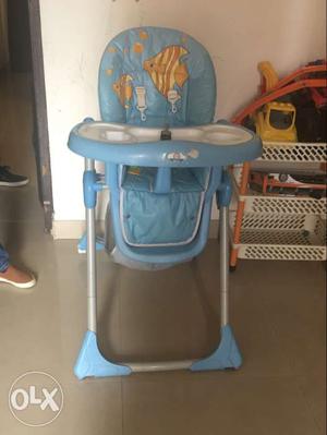 Baby's White And Blue High Chair With Tray
