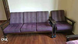 Black Wooden Frame Purple Padded Tufted Couch