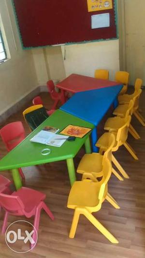 Children's Yellow, Blue, And Green Table And Chairs