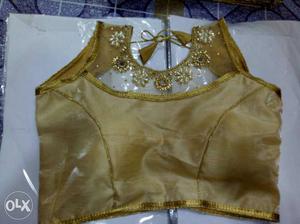 Goldern blouse for party purpose