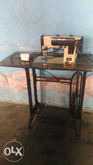 Gray And Black Sewing Machine
