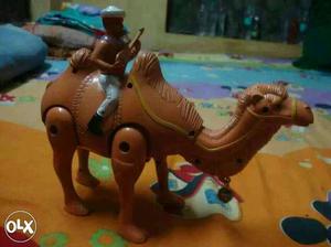 Man Riding Camel Plastic Toy
