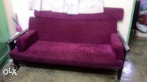 Maroon colour TEAK WOOD sofa in perfect condition